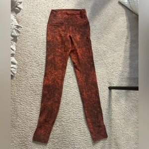Lululemon leggings with red pattern